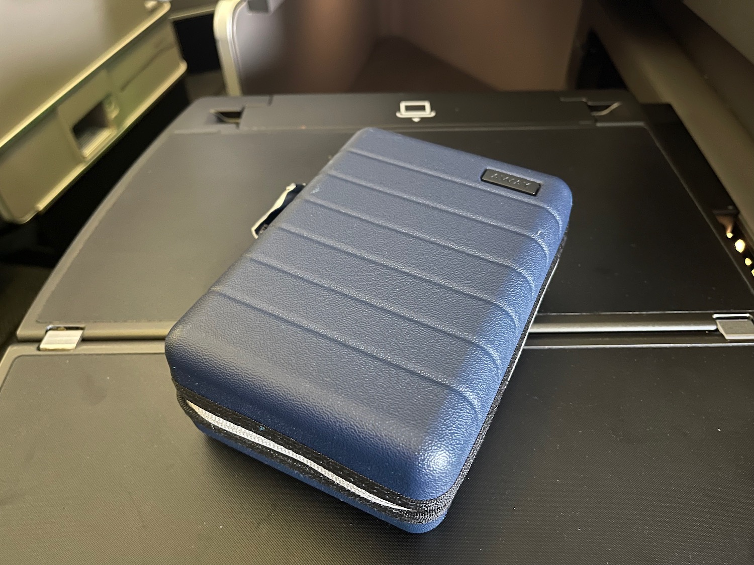 a blue case on a black surface