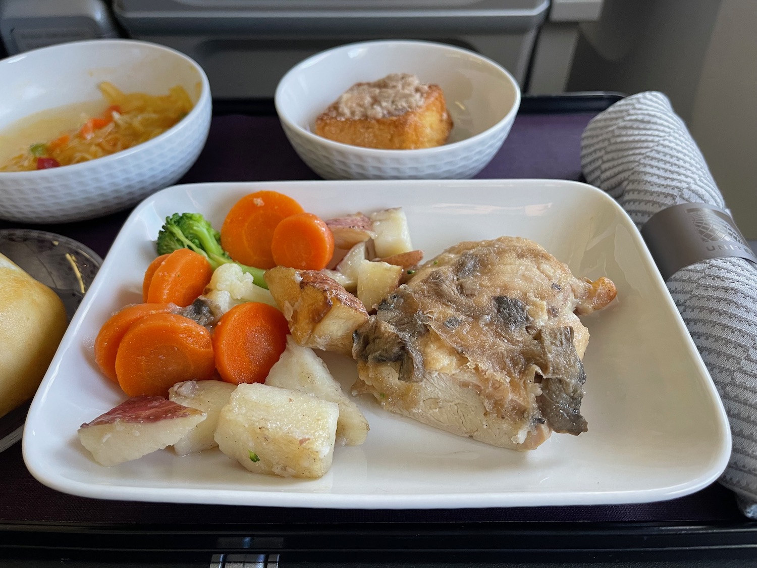 a plate of food on a tray