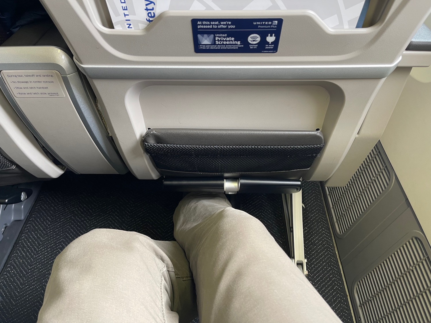 a person's legs in a seat