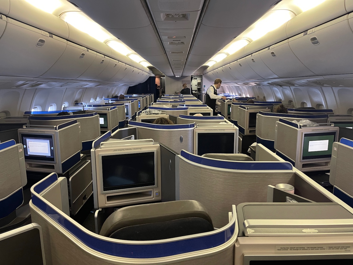 an airplane with rows of monitors