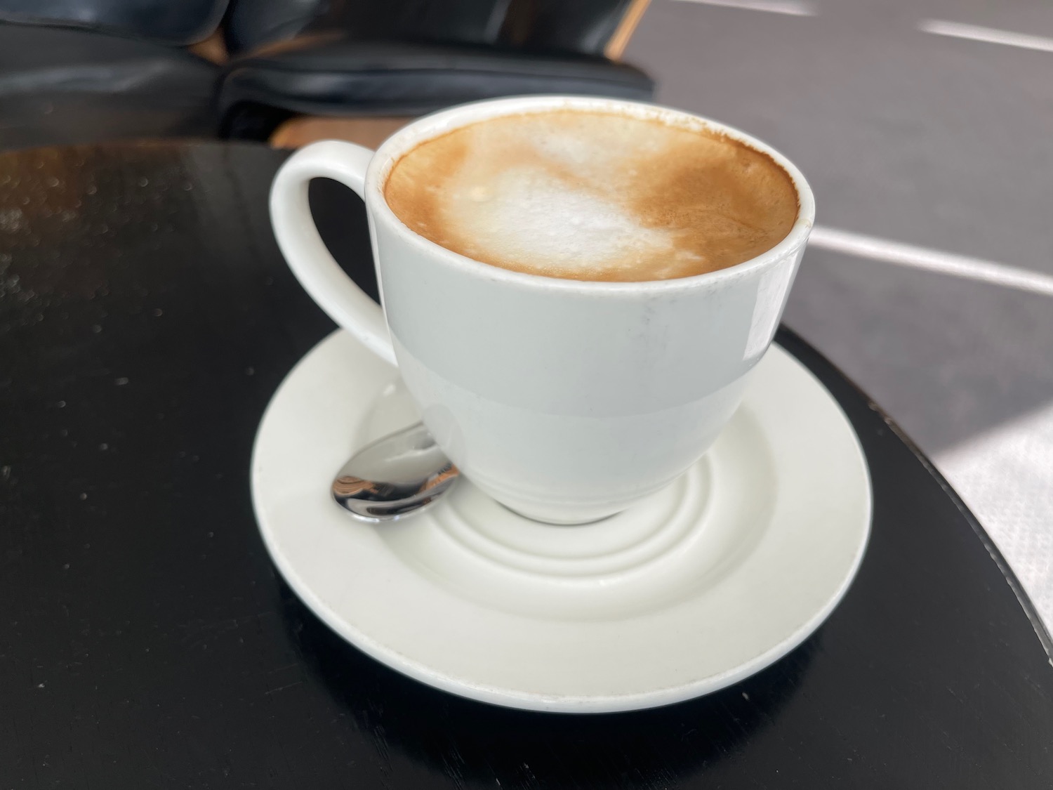 a cup of coffee on a saucer