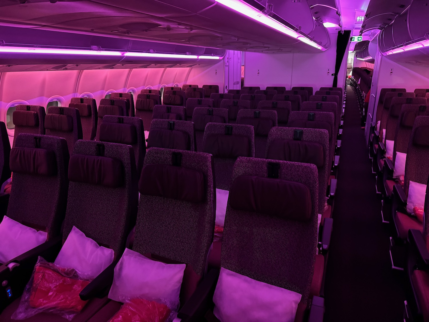 an airplane with purple lights