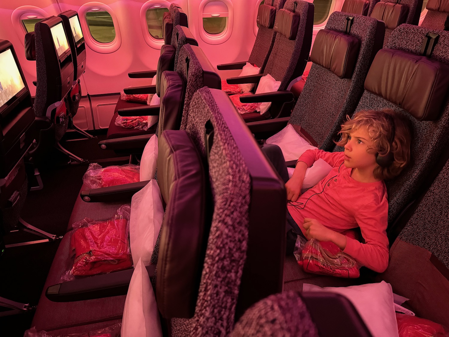 a child sitting in an airplane