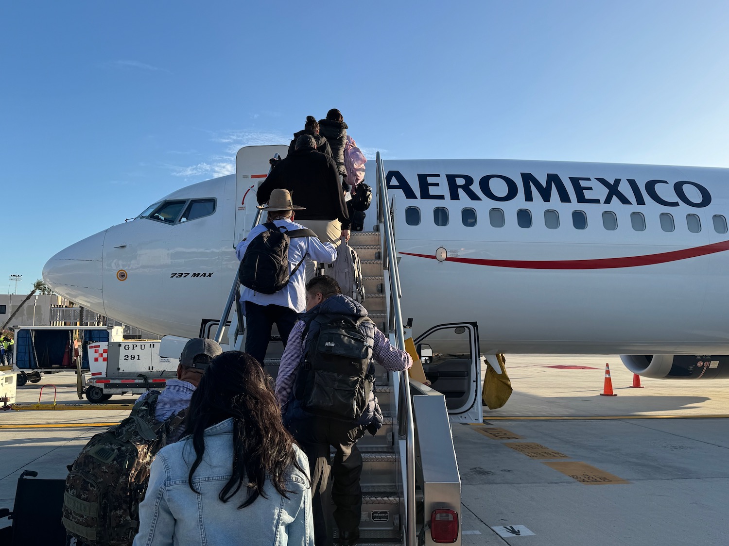 people boarding an airplane