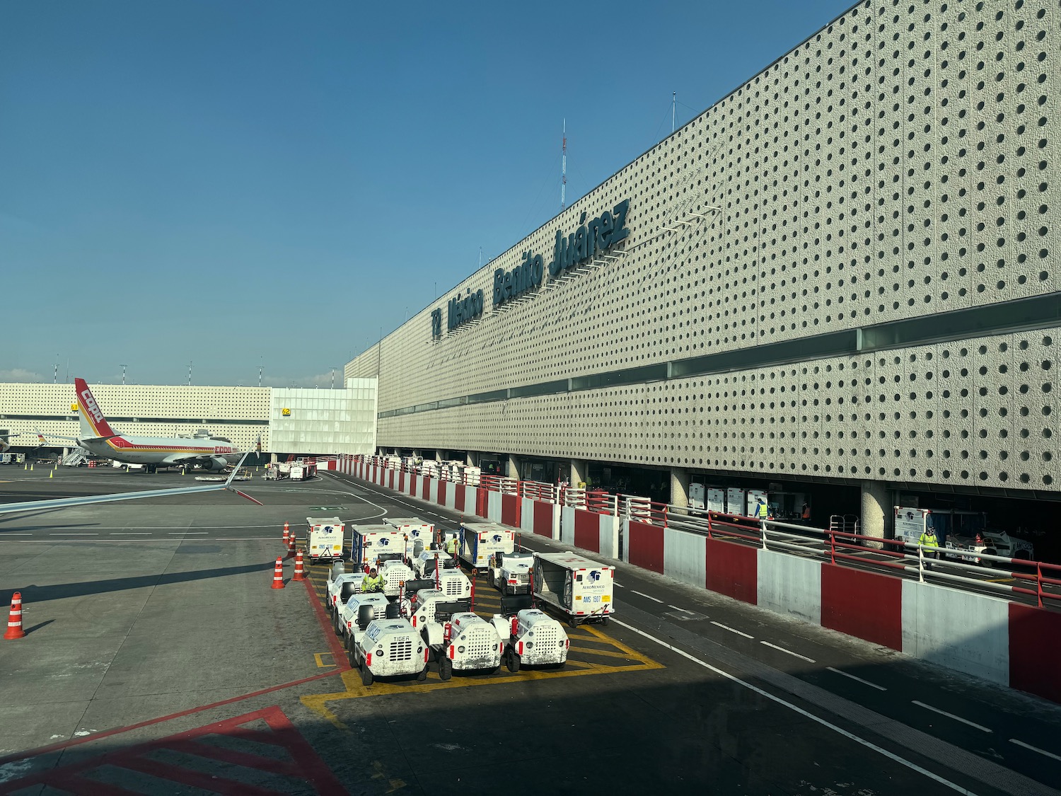 a group of vehicles parked in front of a building