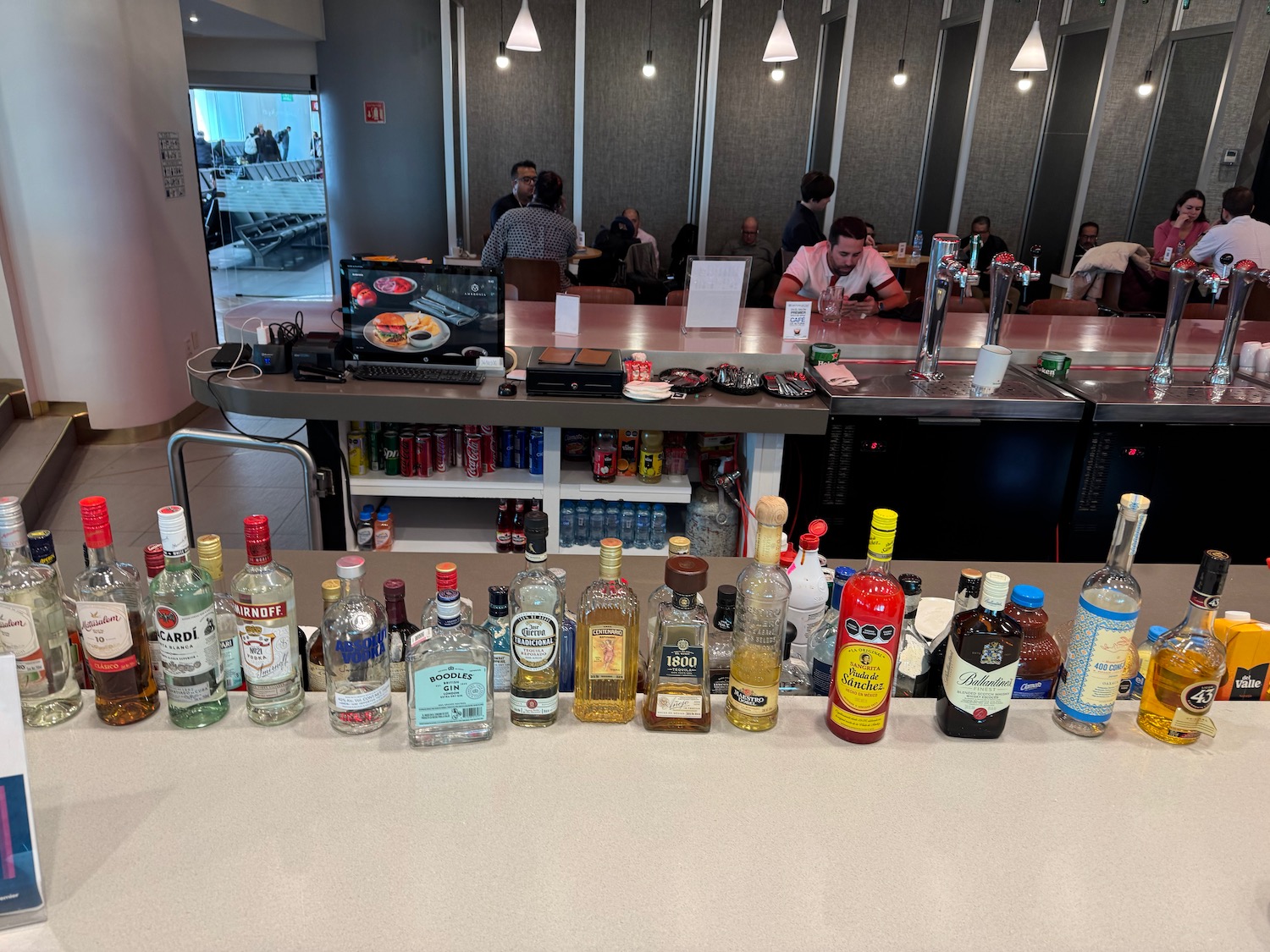 a bar with bottles of alcohol