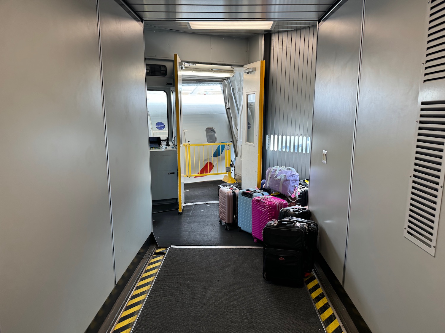 a hallway with luggage on it