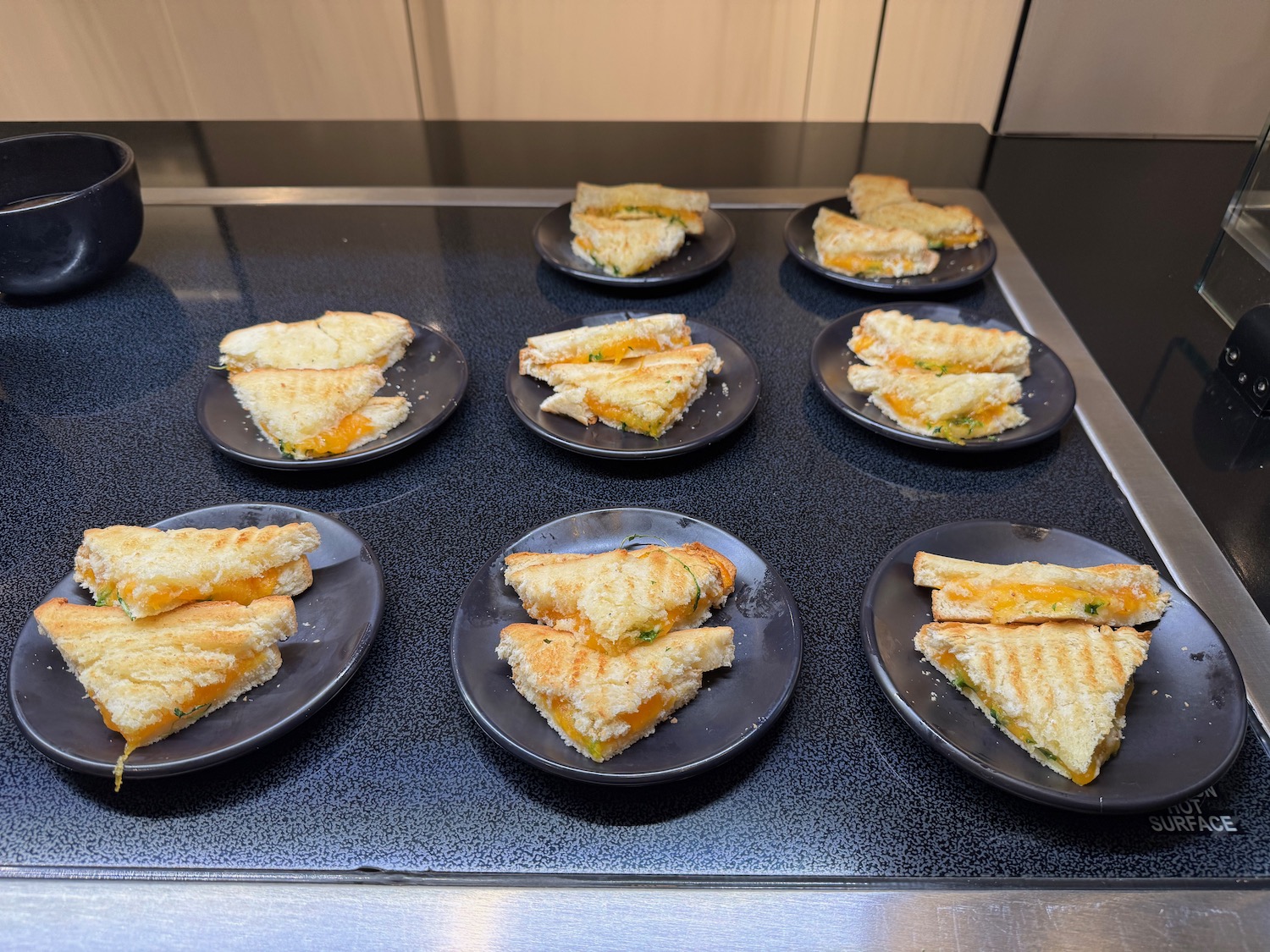 plates of sandwiches on a counter