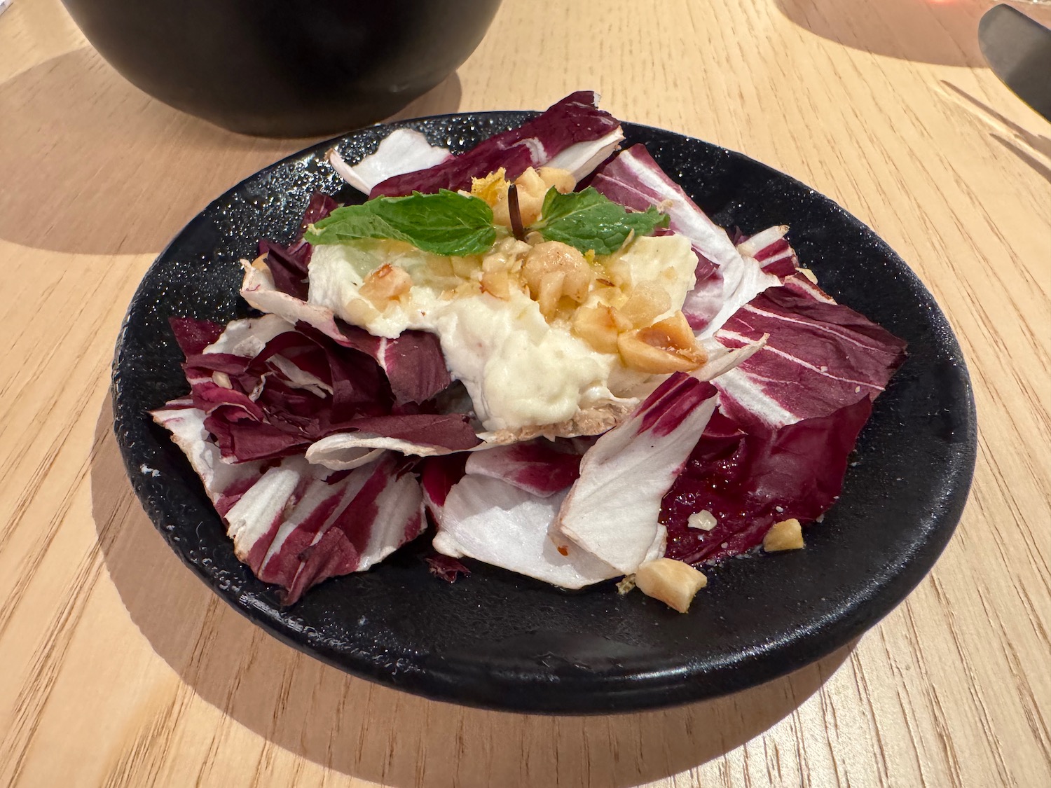 a plate of salad on a table