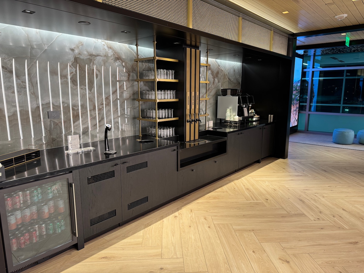 a black counter with bottles on it