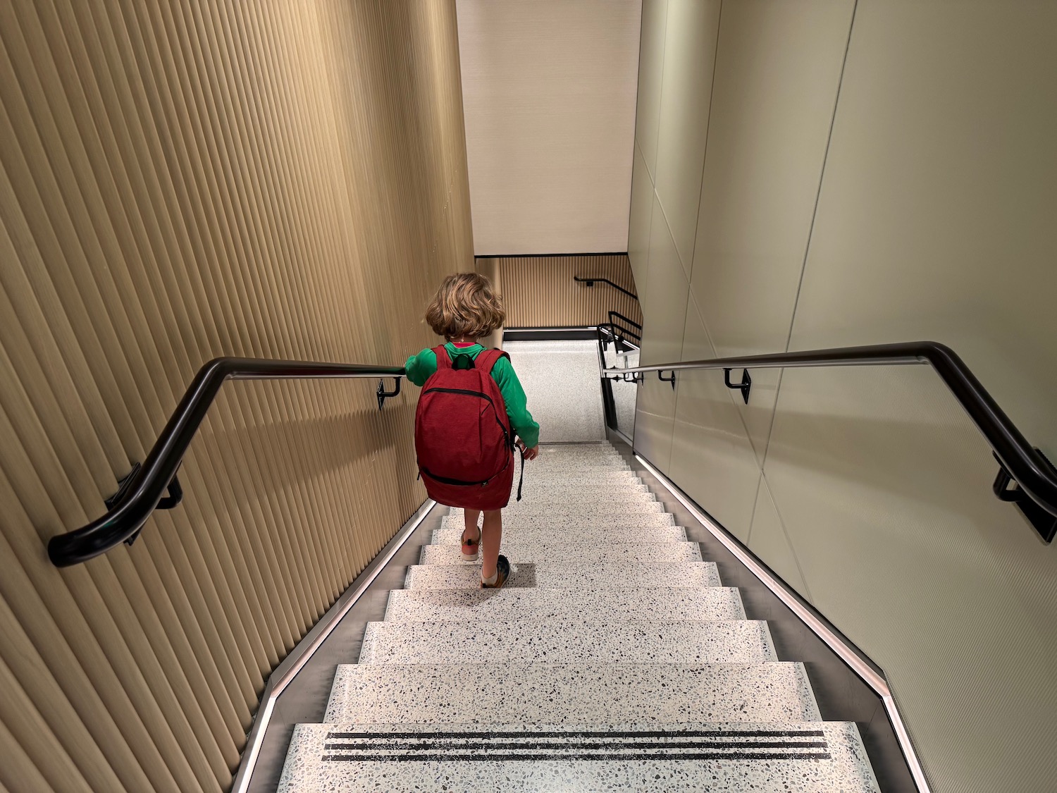 a child walking up stairs