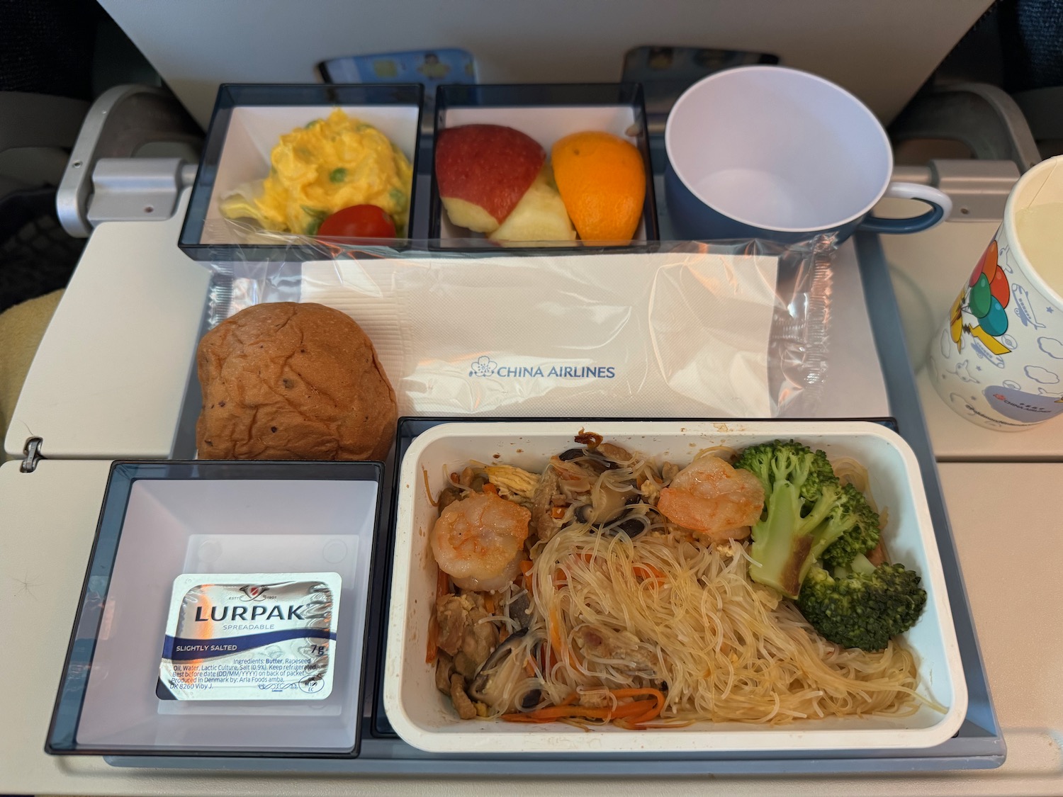 a tray of food on a plane