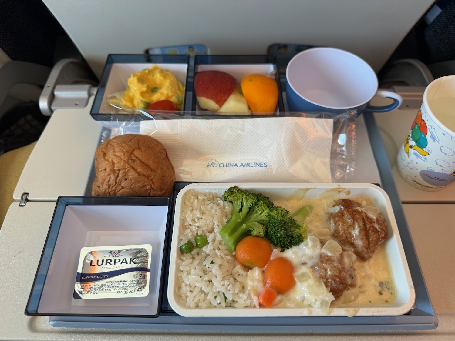 a tray of food on a plane