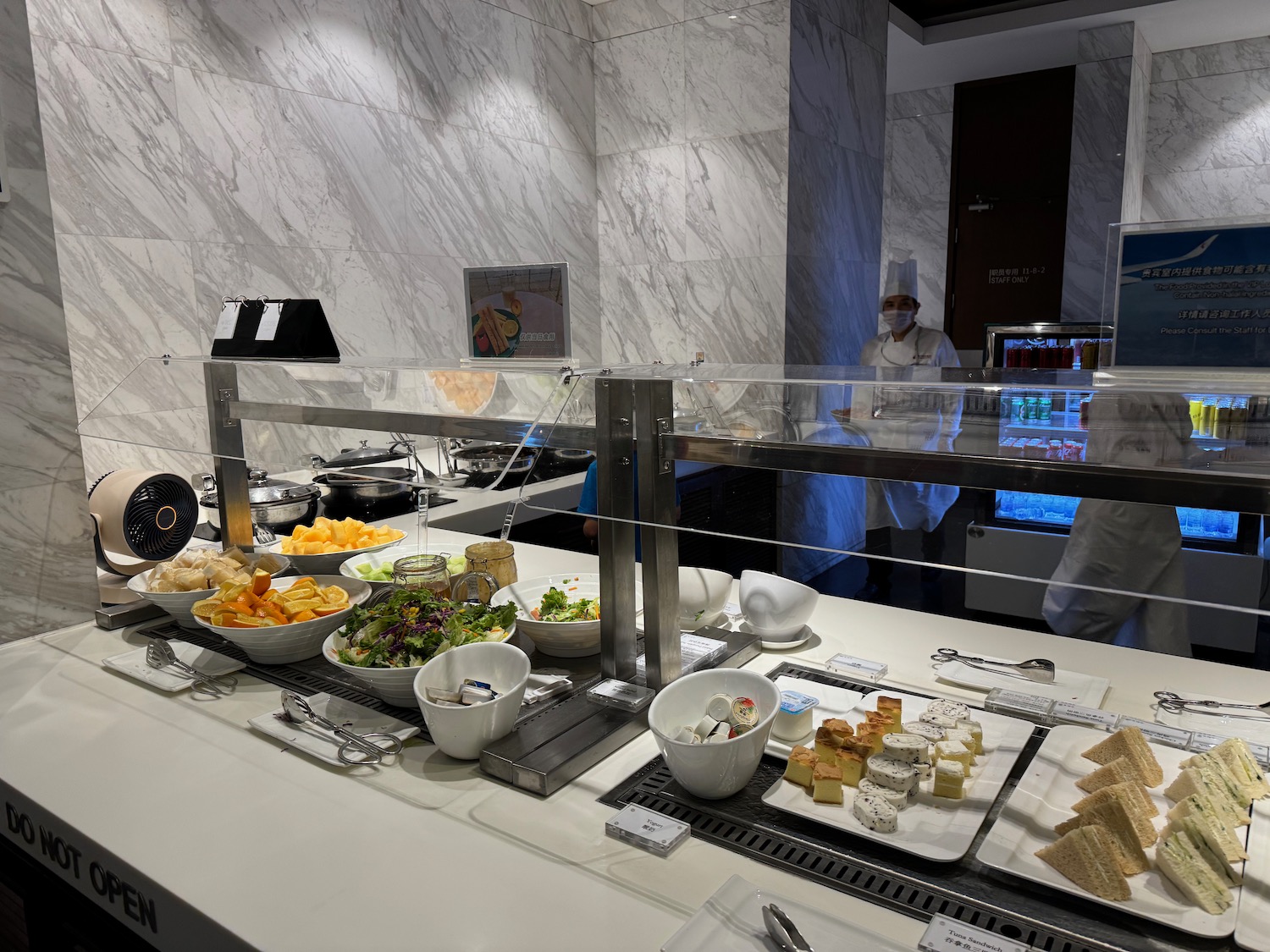 a buffet with food on the counter