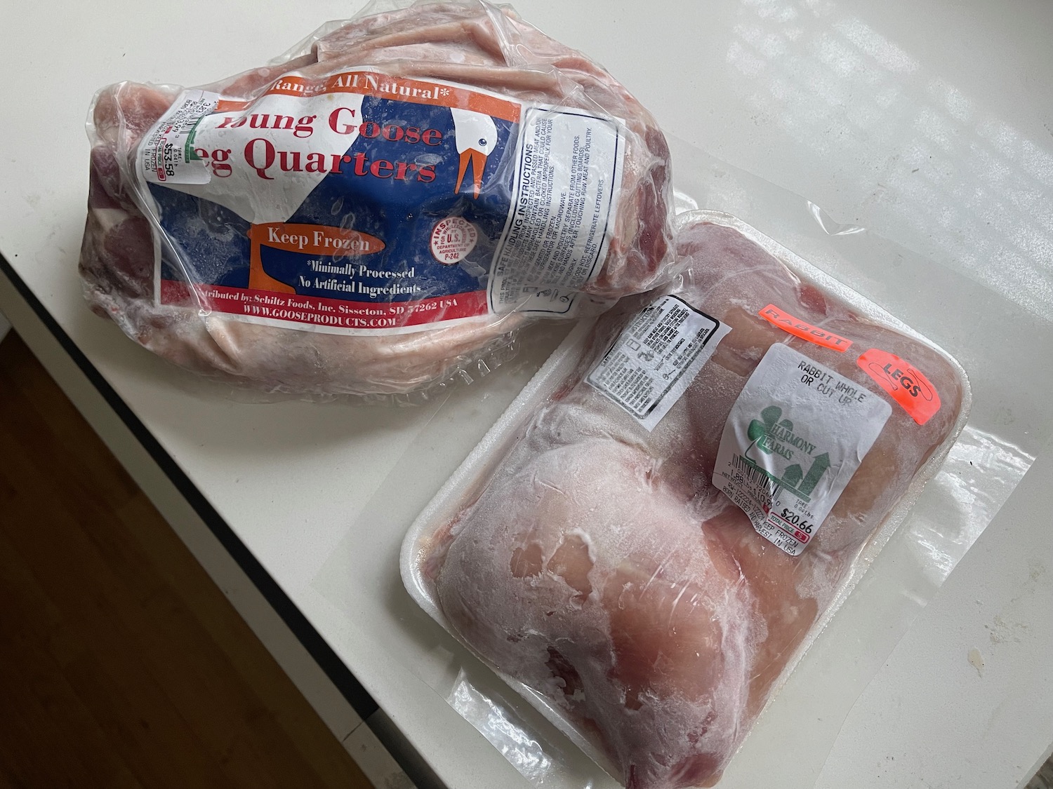 frozen meat in plastic bags on a counter