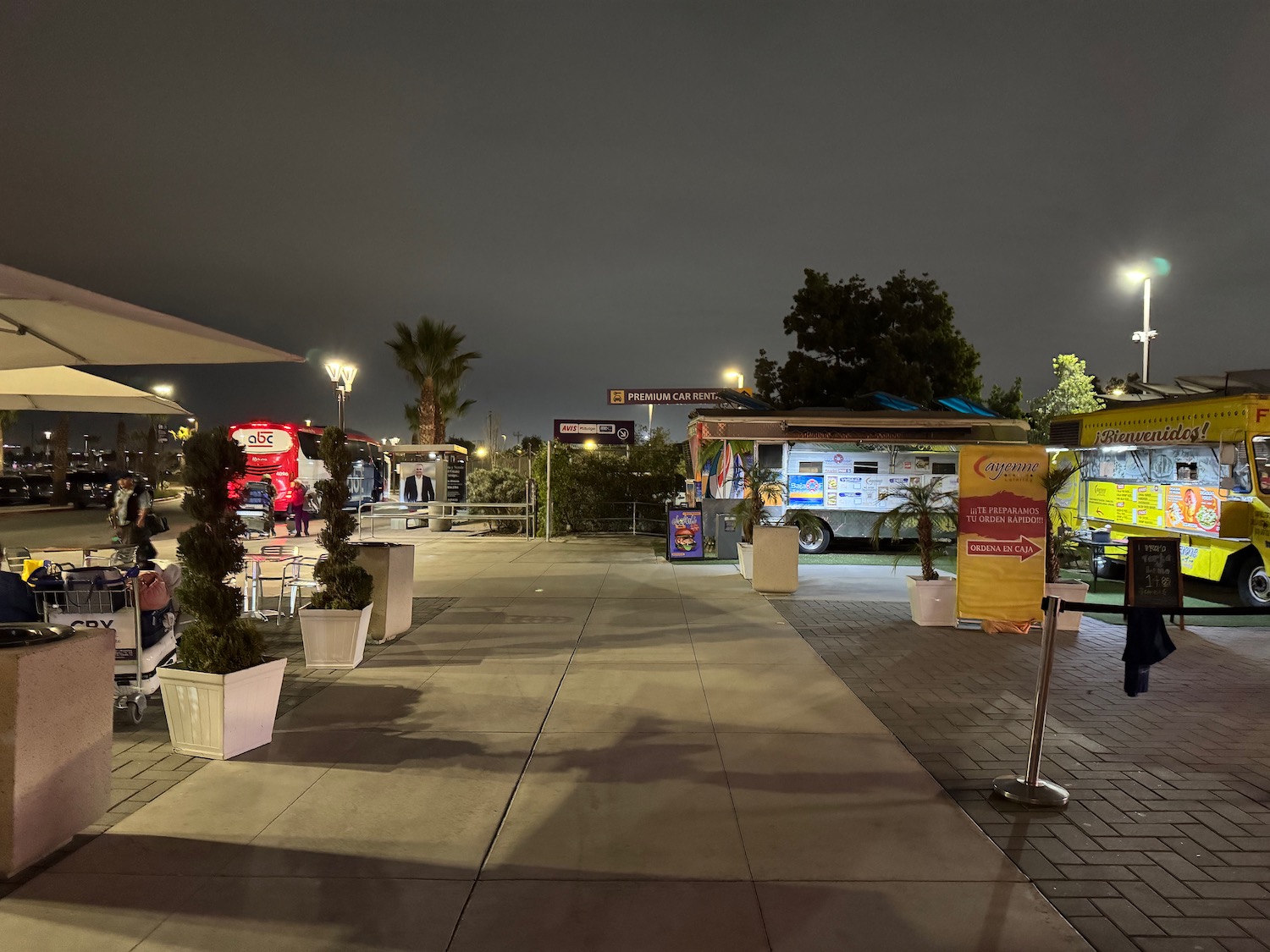 food trucks parked on a sidewalk