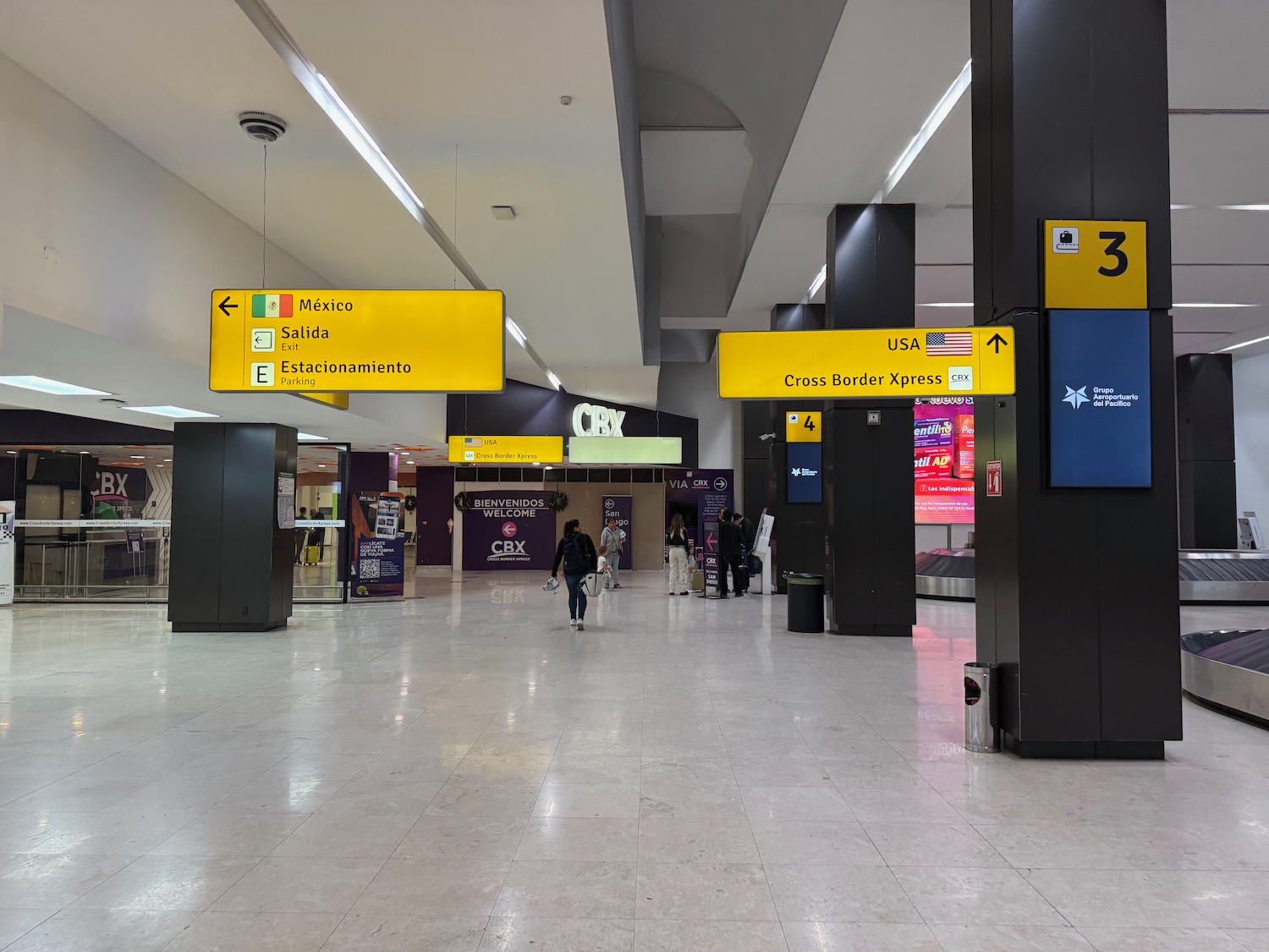 people walking in a large airport