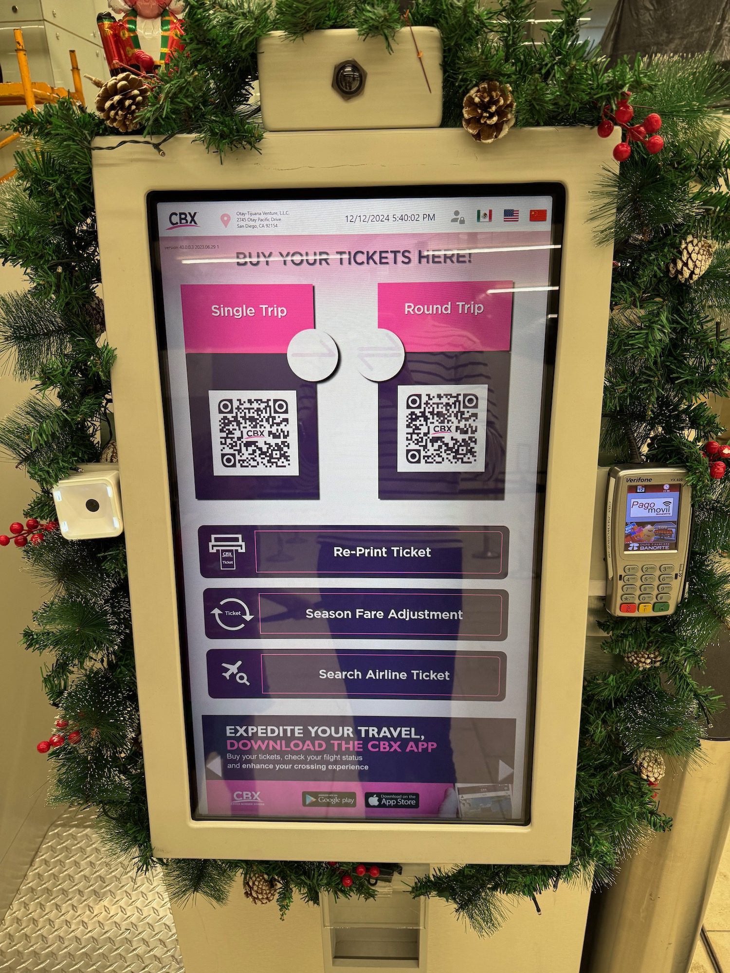 a machine with a screen and a qr code