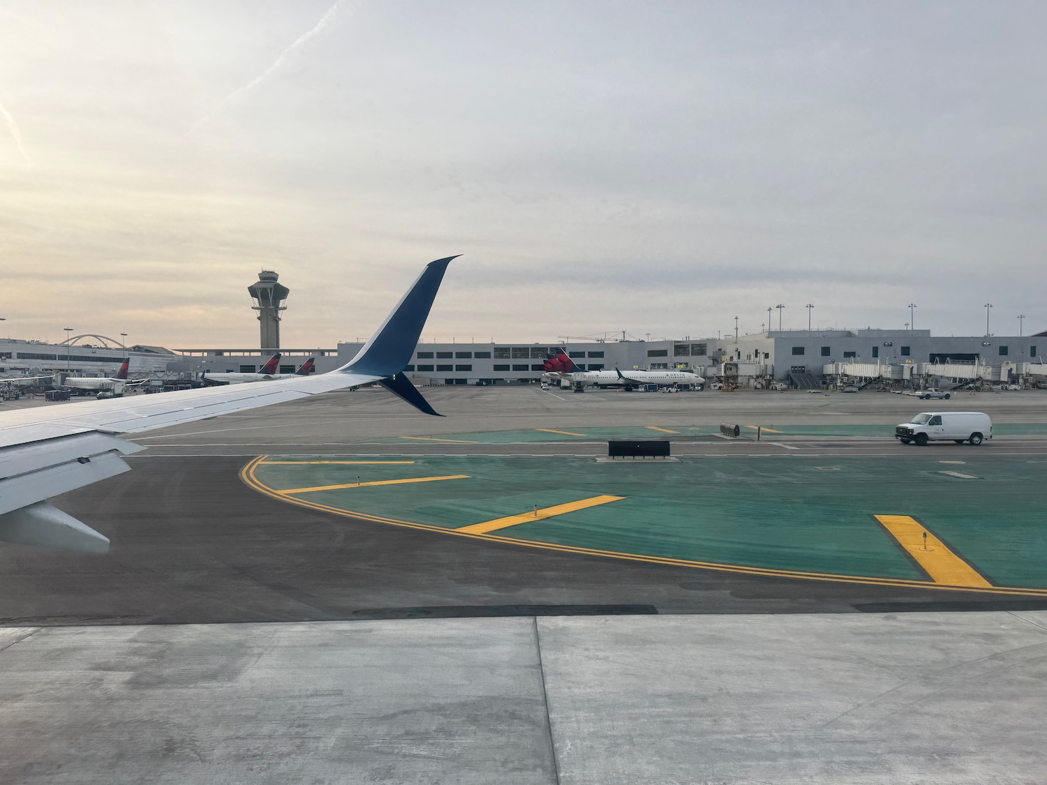 an airplane wing on a runway