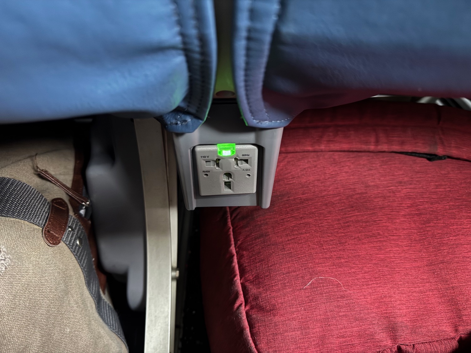 an electrical outlet on a seat