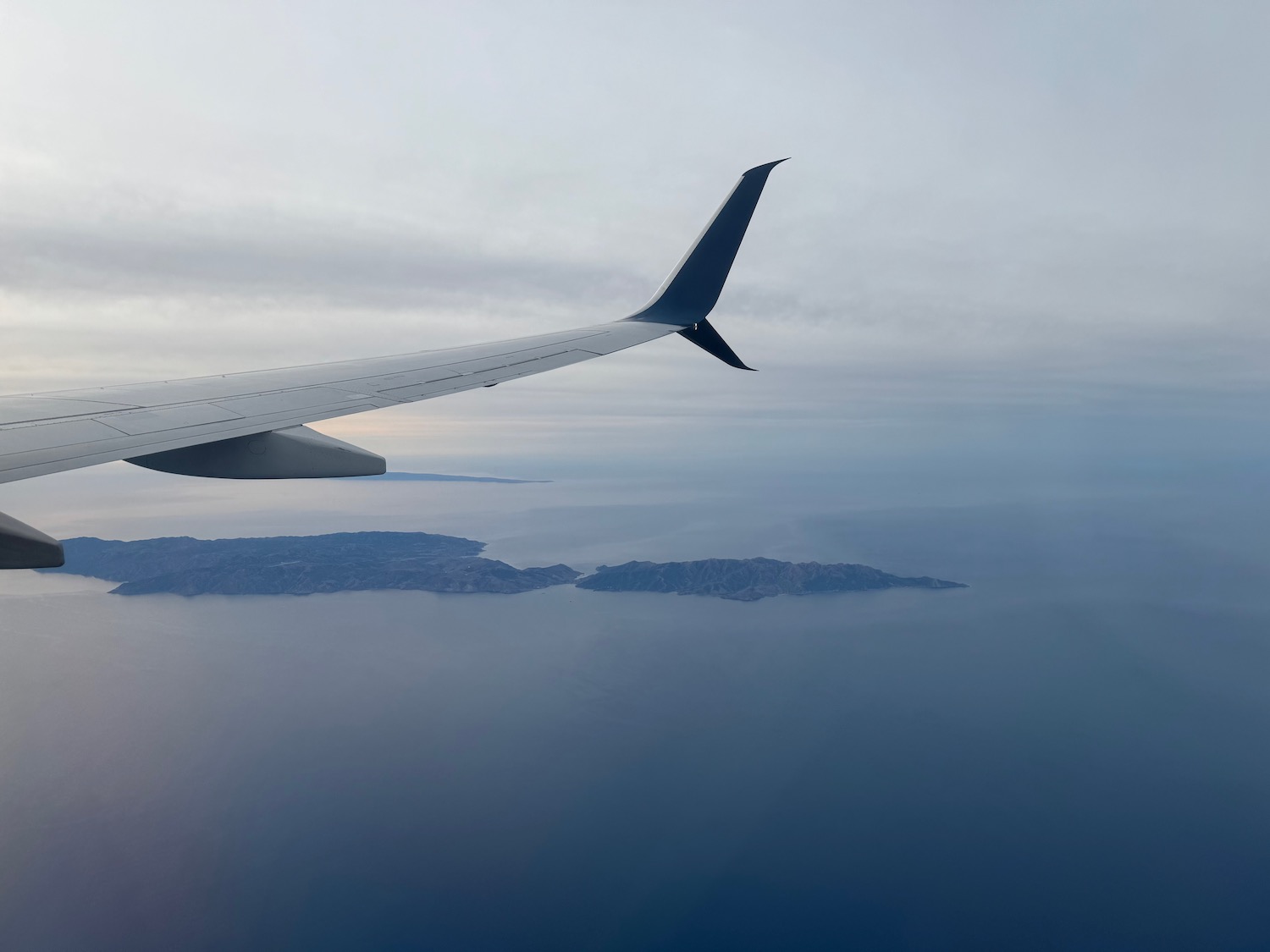 an airplane wing above water