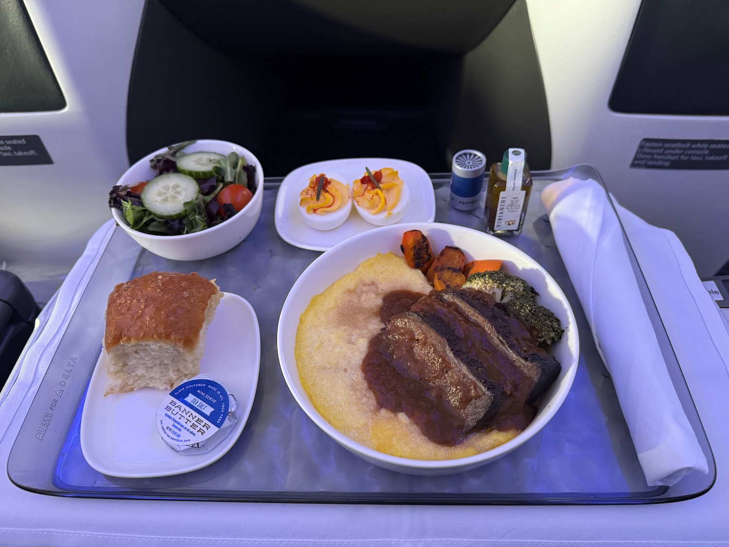 food on a tray on a plane