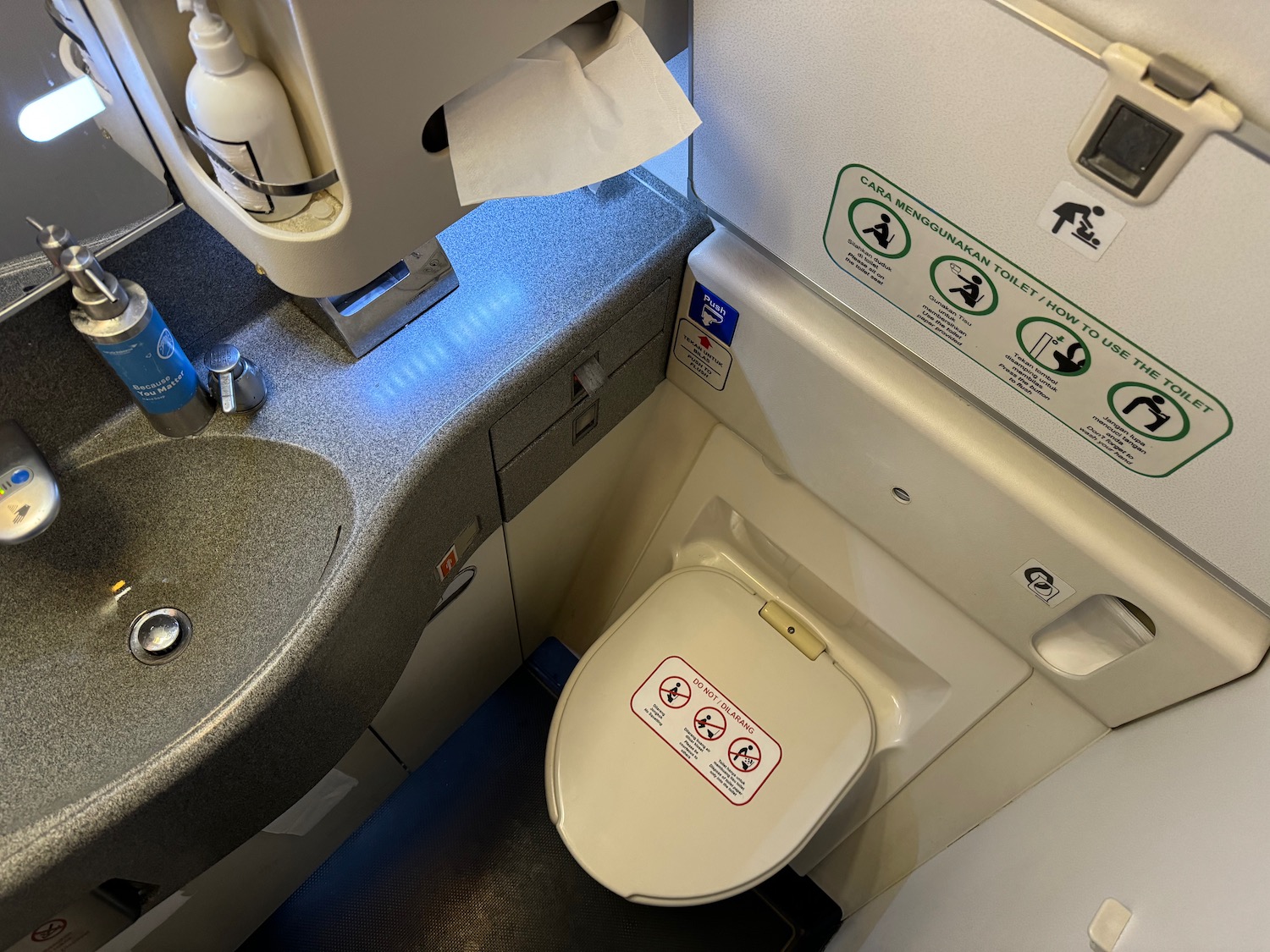 a toilet and sink in a plane