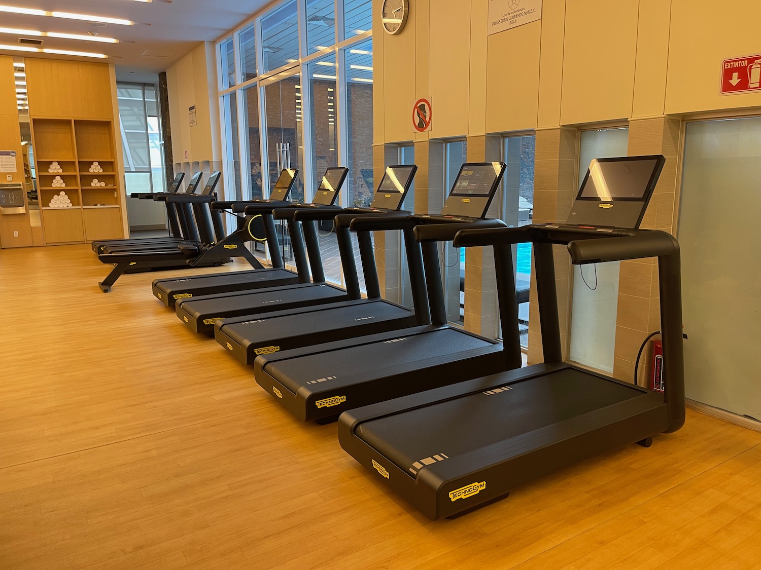 a row of treadmills in a room