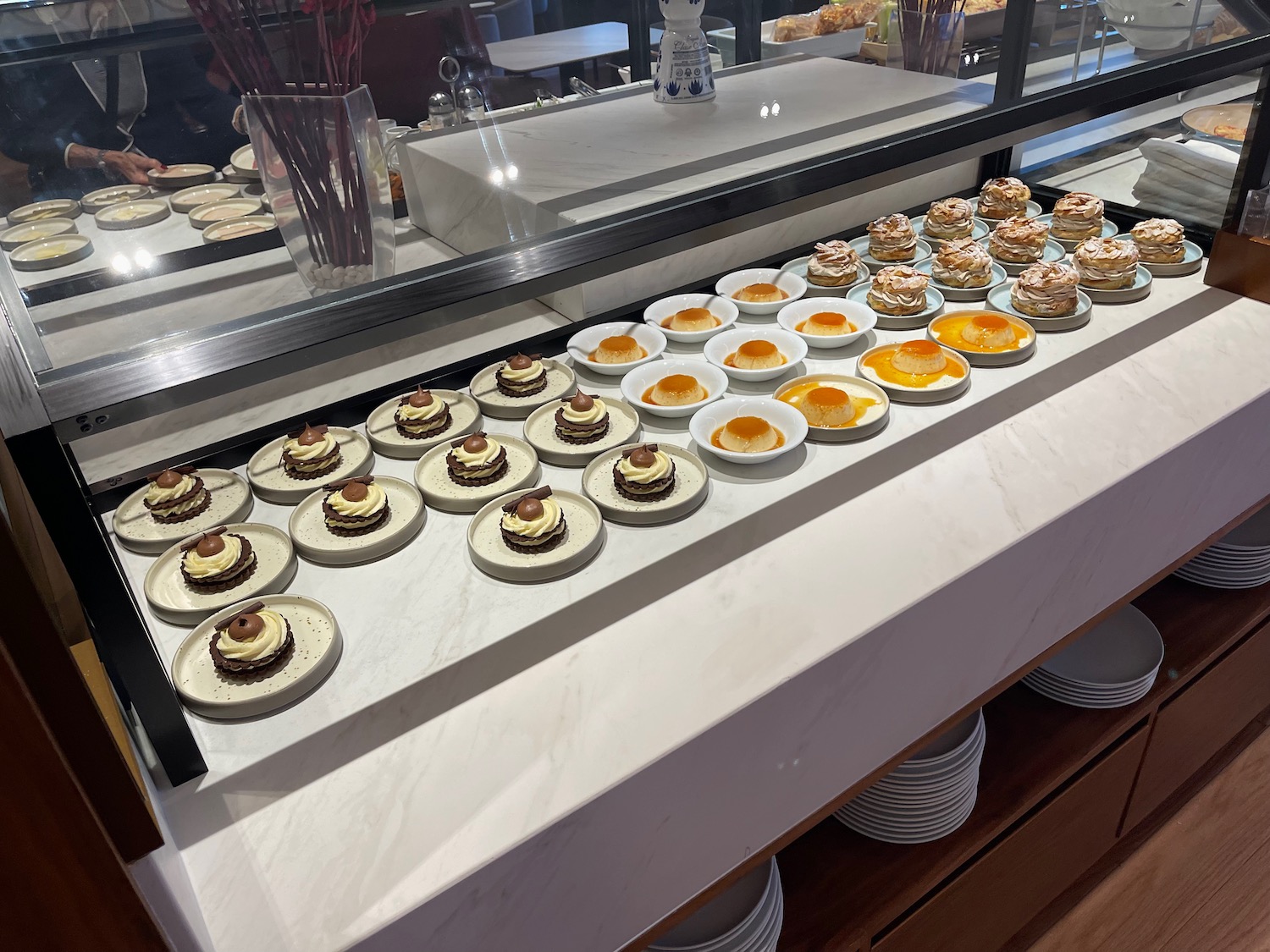 a display of desserts on plates