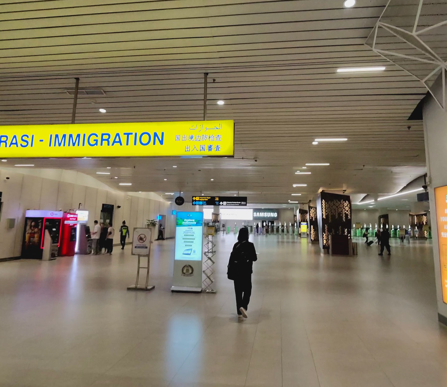 a person walking in a large airport