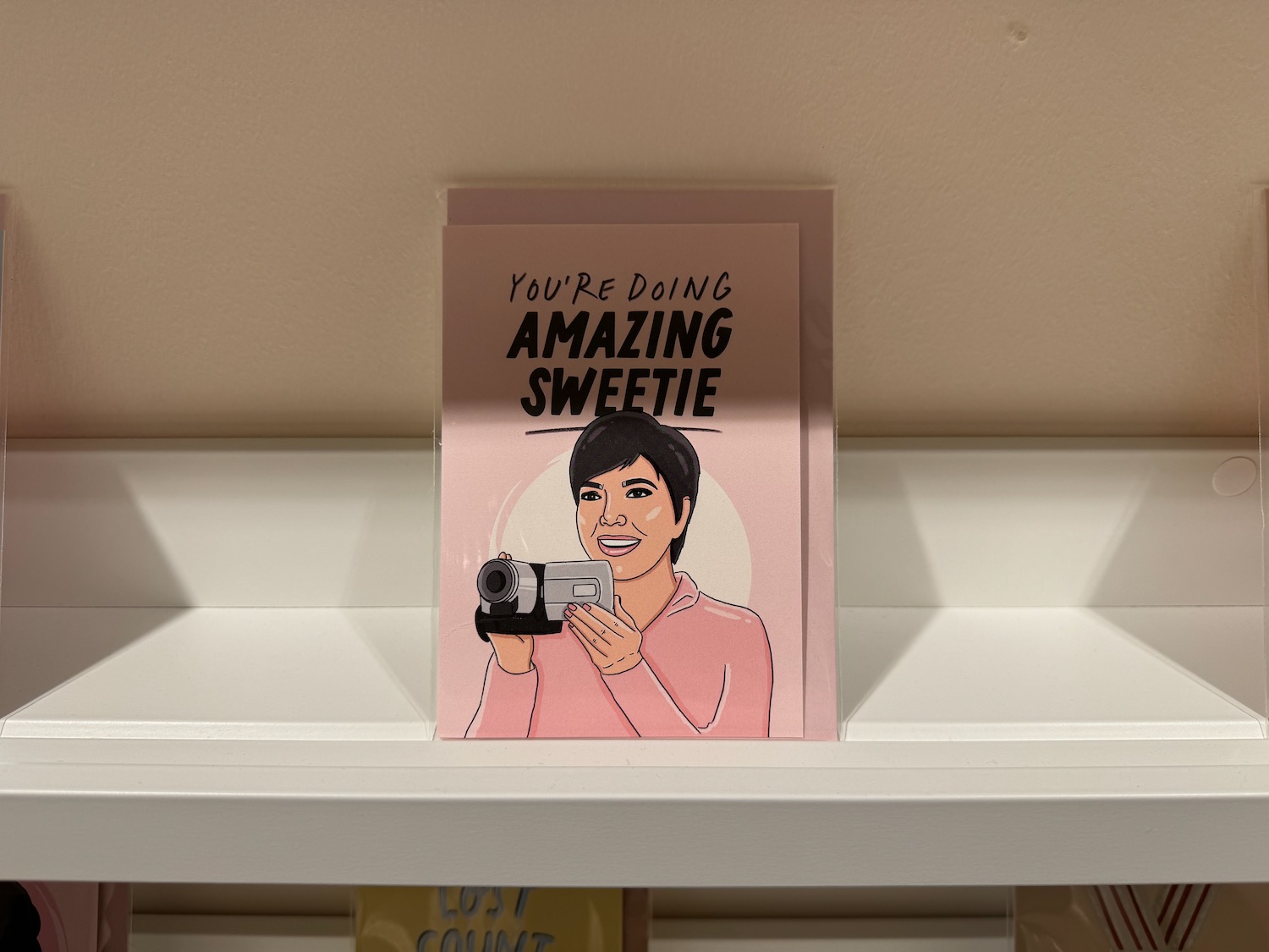 a card on a shelf