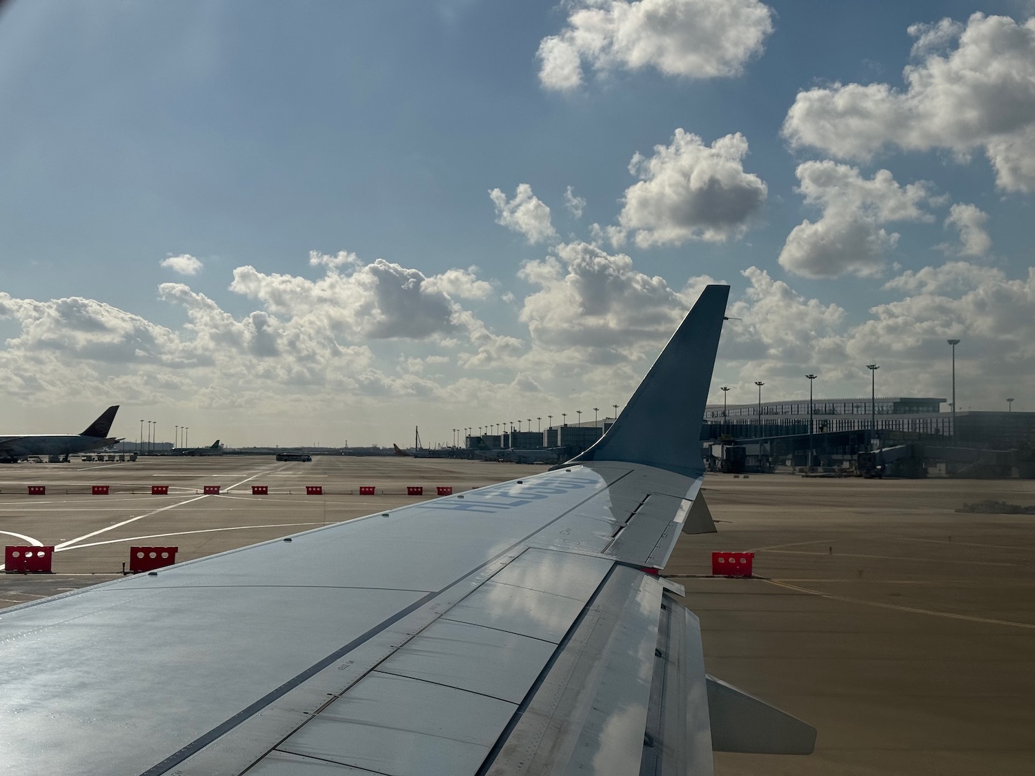 an airplane wing on a runway