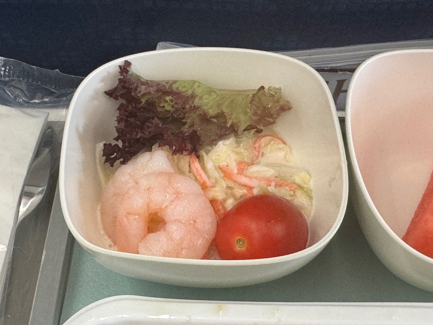 a bowl of food on a tray