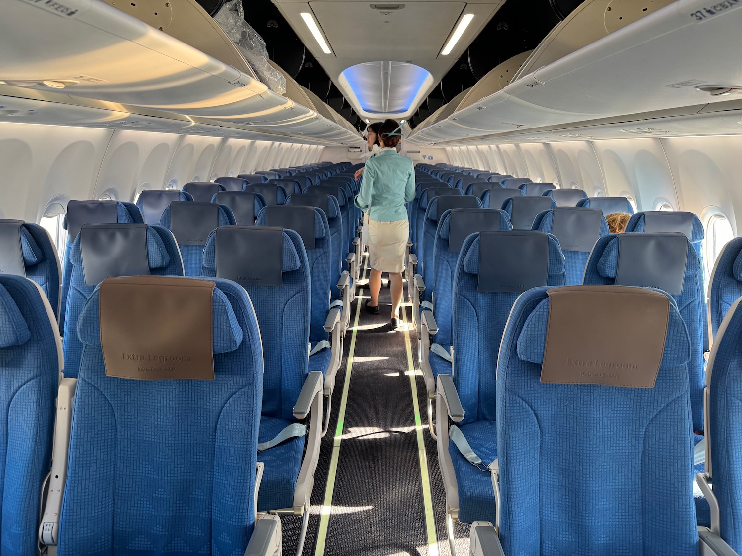 a person walking in an airplane