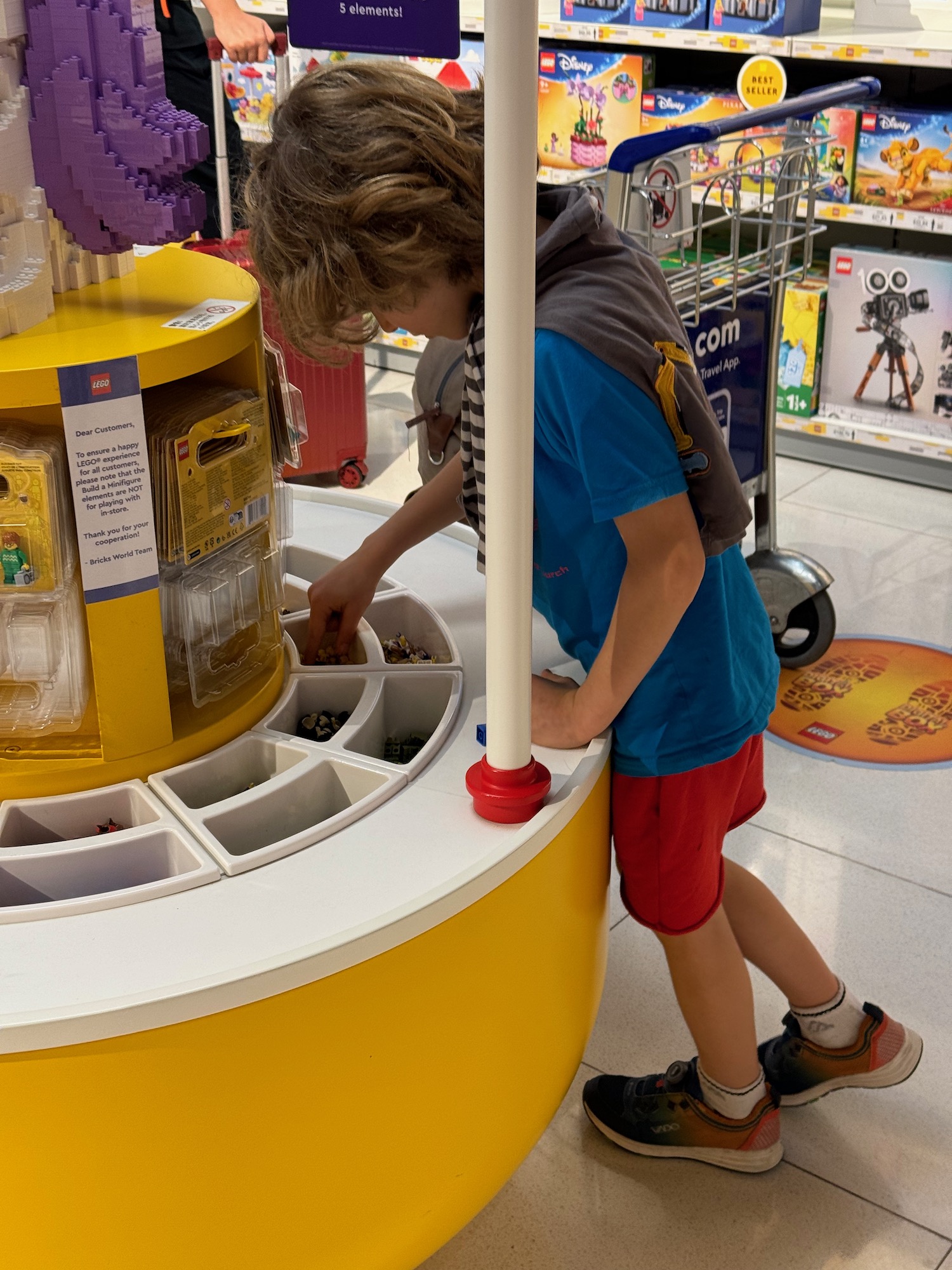 a boy playing with a toy