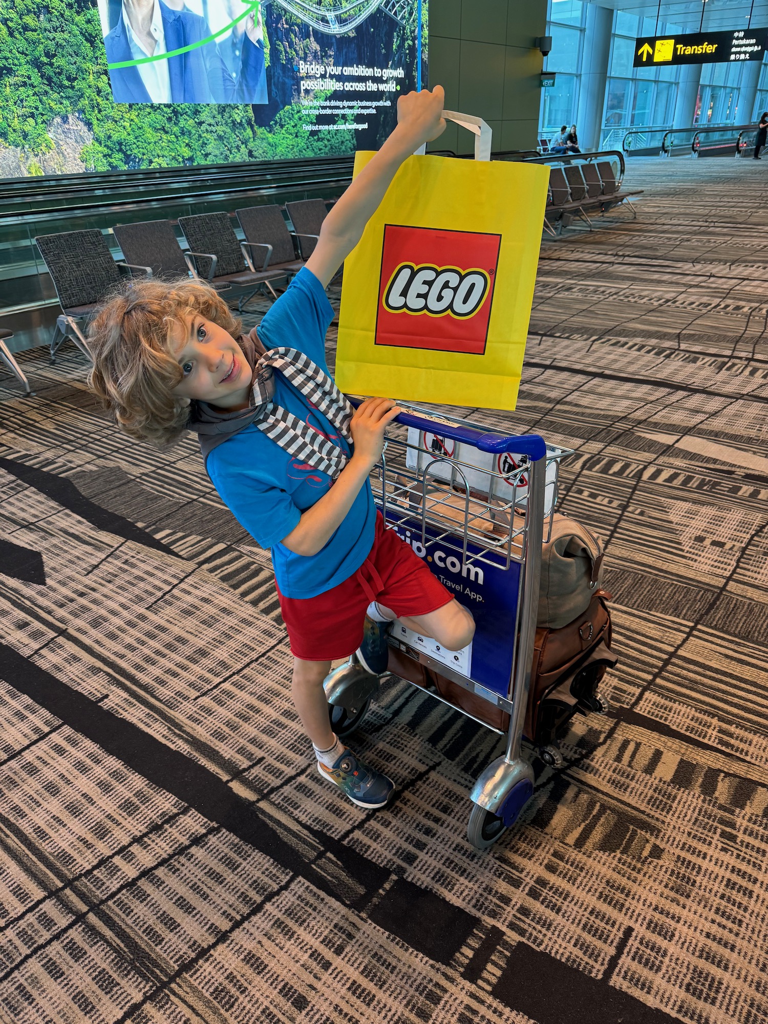 a child holding a bag