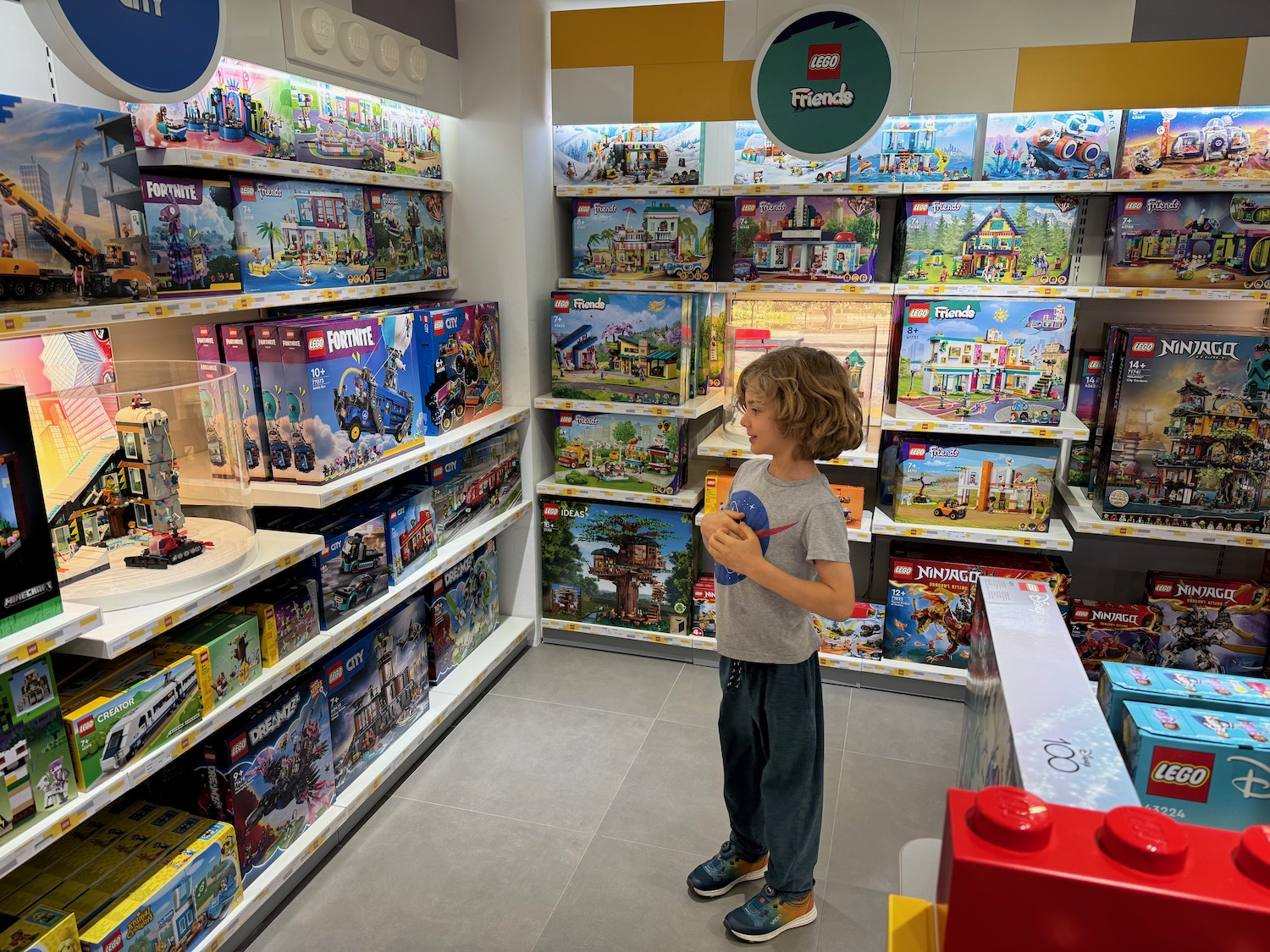 a child standing in a toy store