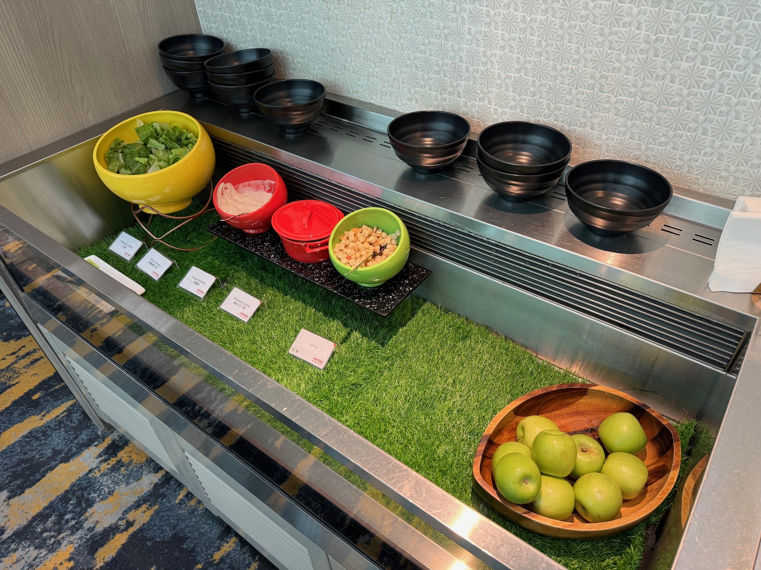 a row of bowls on a counter