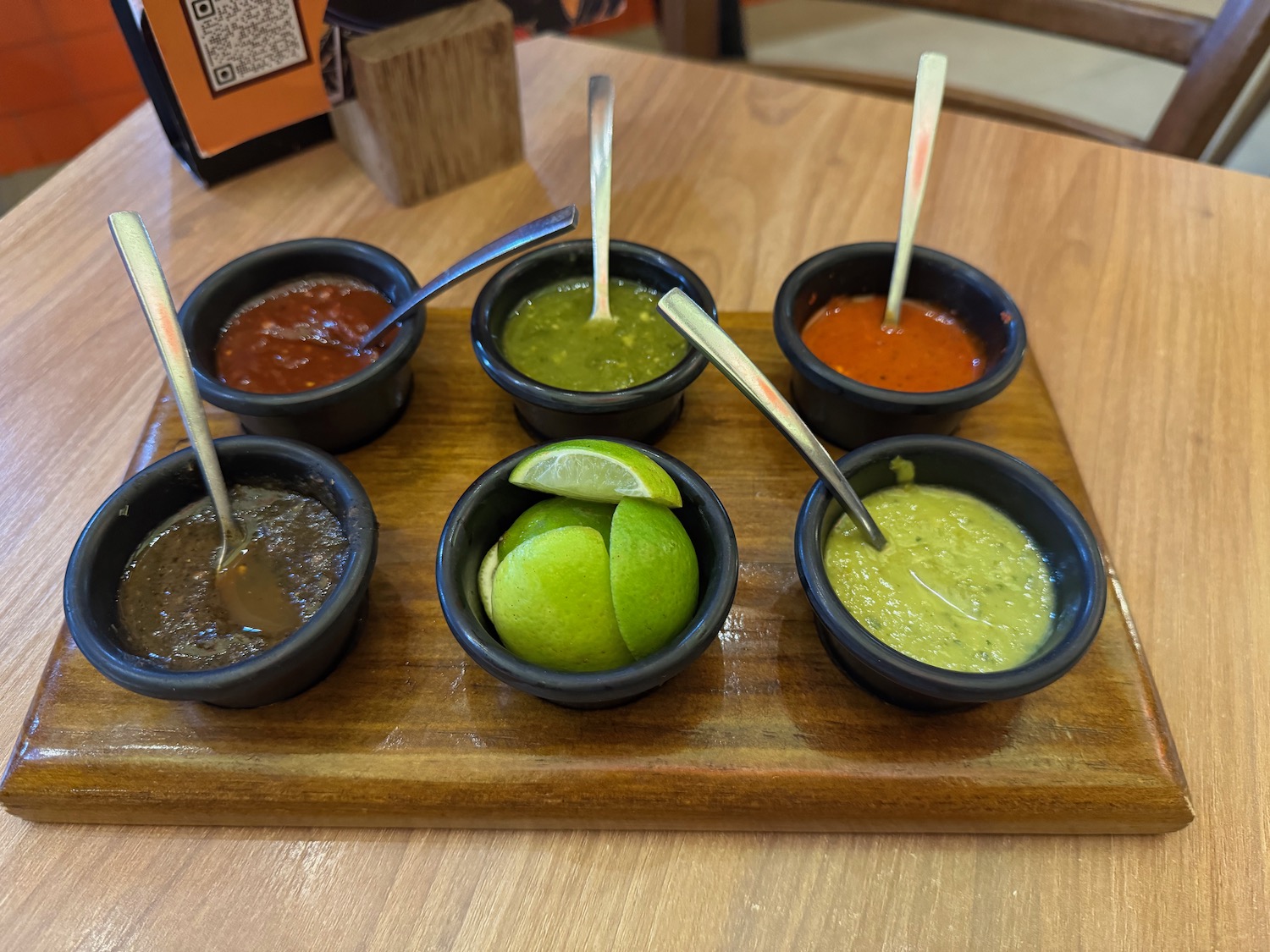 a tray of different sauces