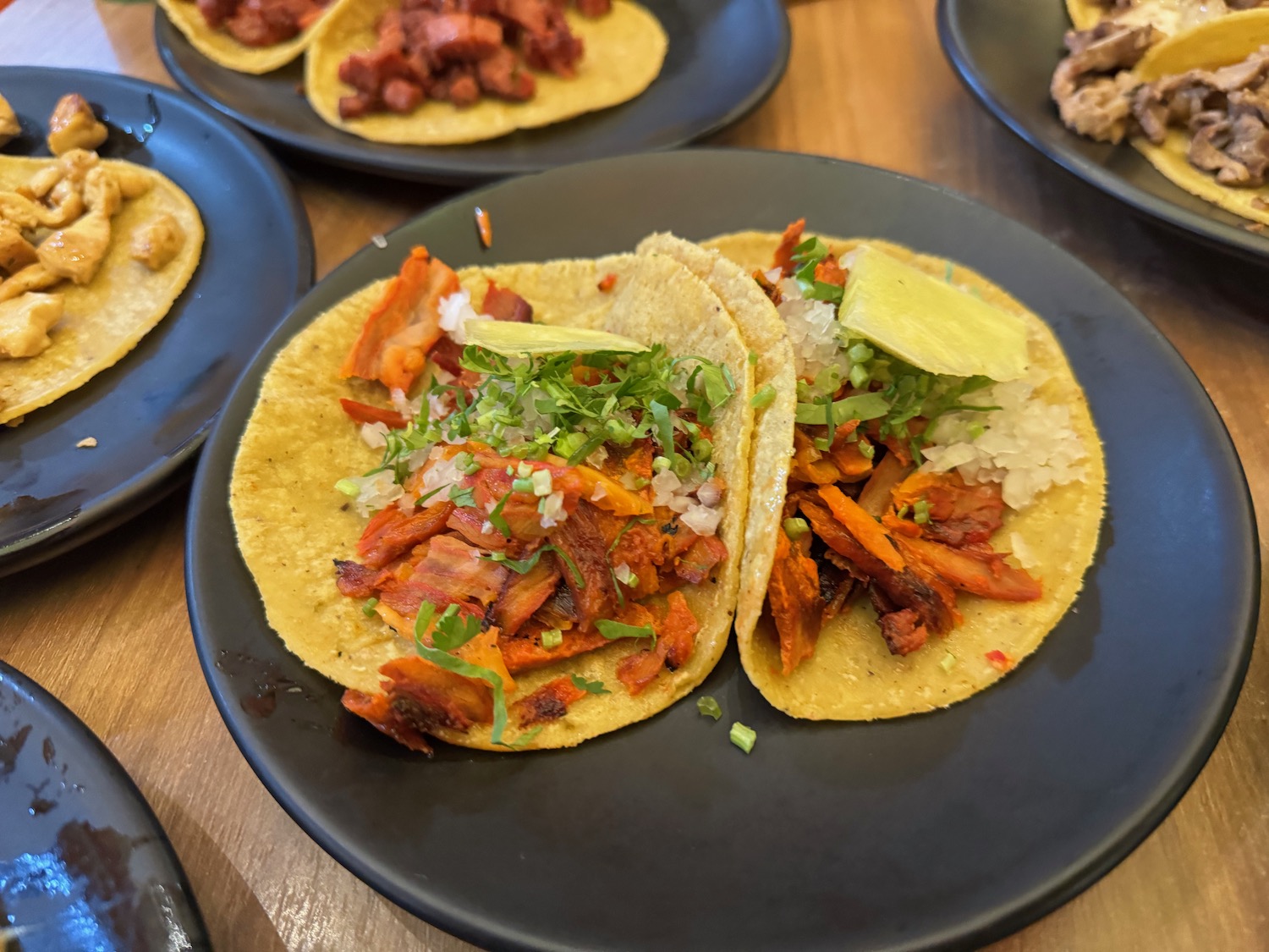 a plate of tacos on a table