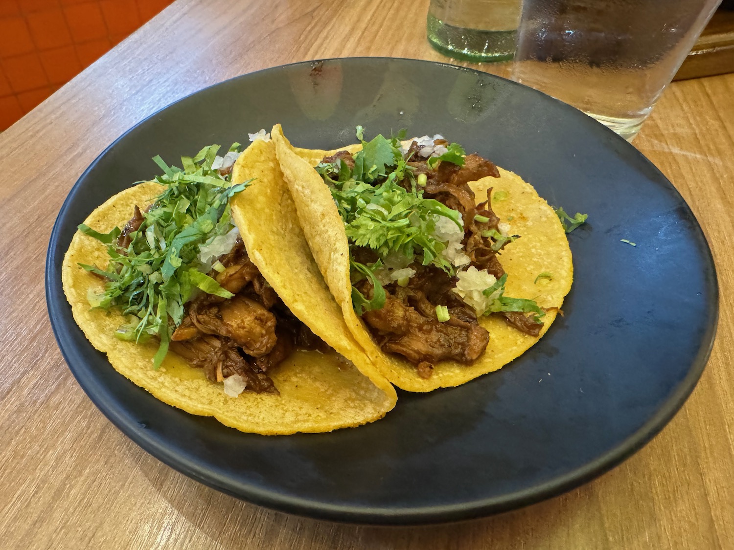 a plate of tacos on a table