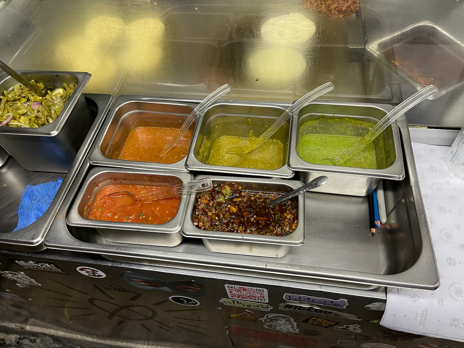 a trays of different colored sauces