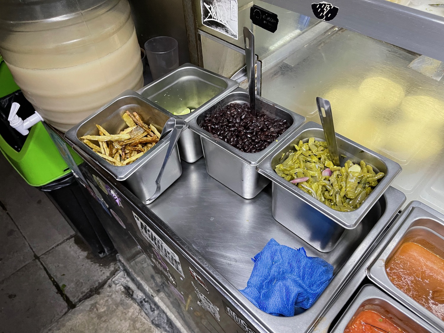 a trays of food on a counter