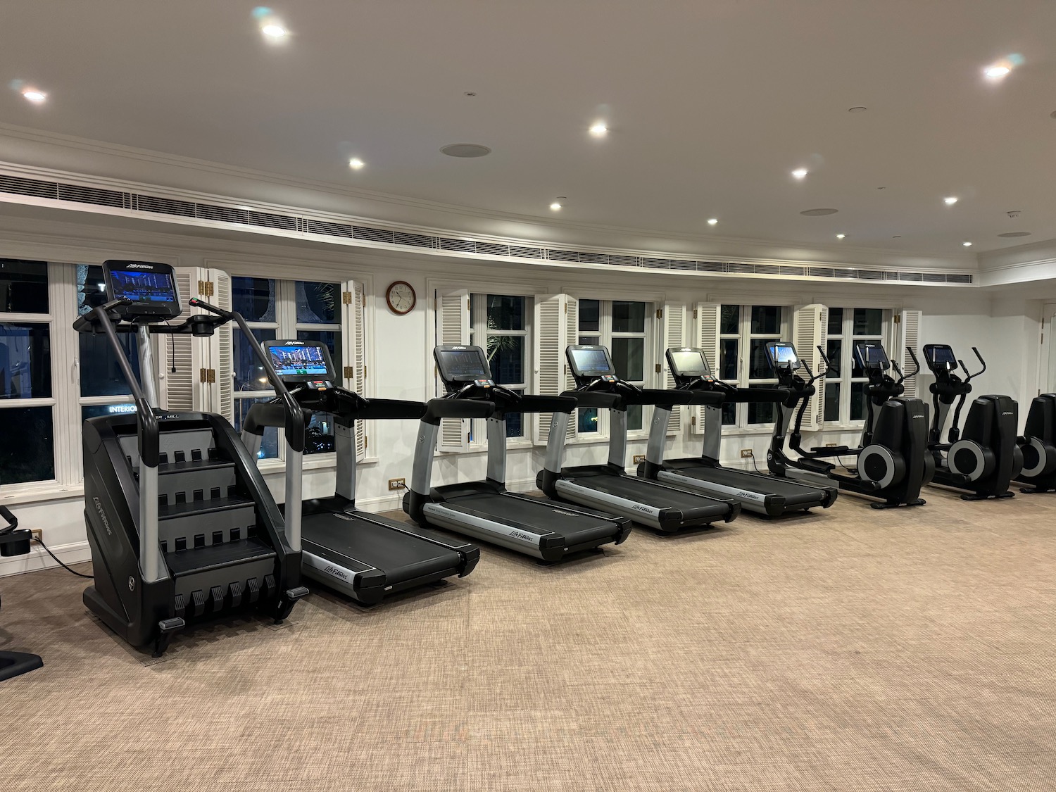 a group of treadmills in a room