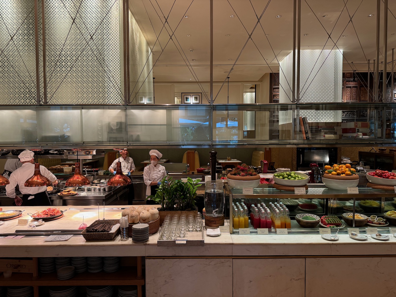 a group of people cooking in a restaurant