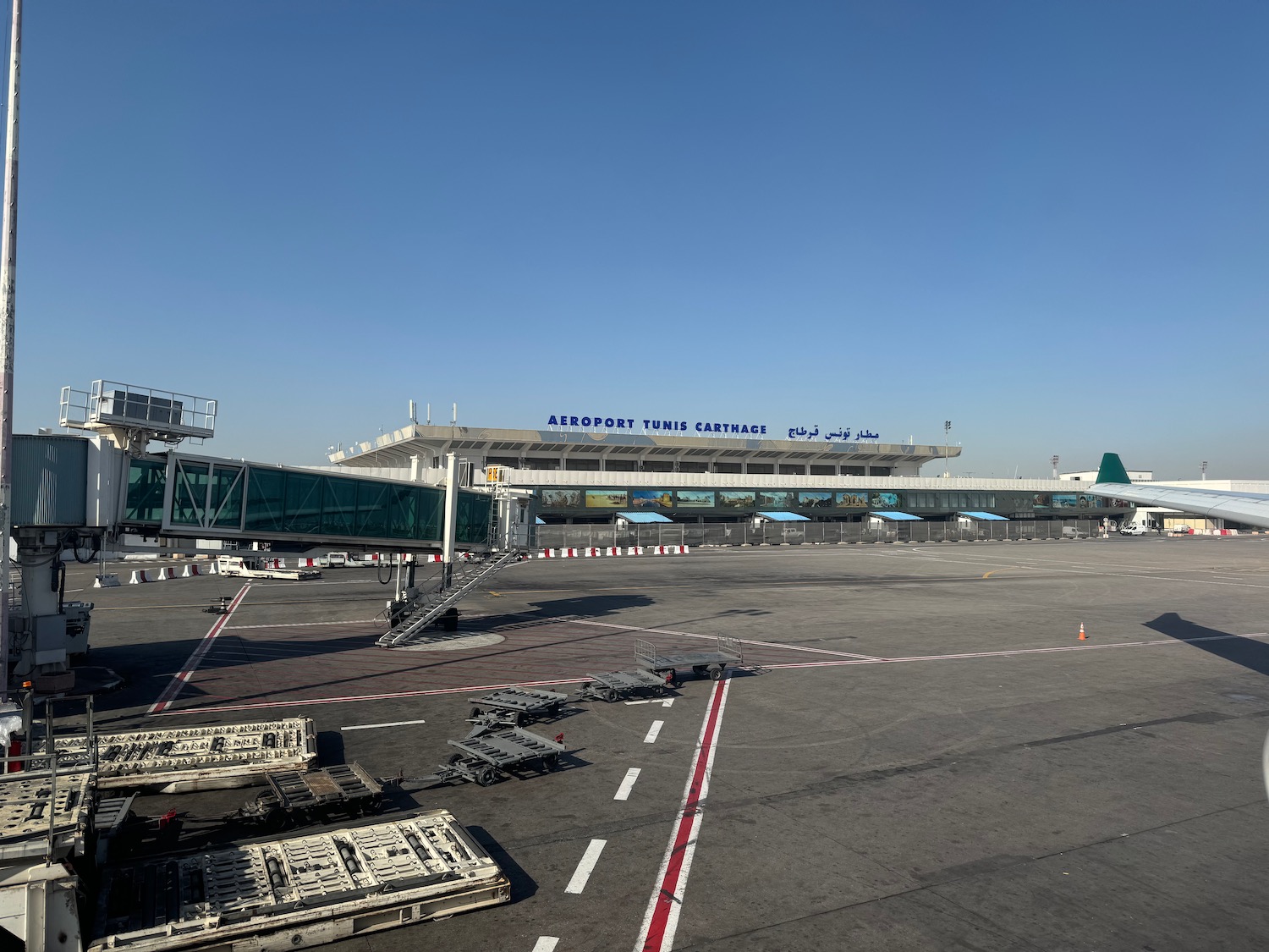 a runway with a building in the background