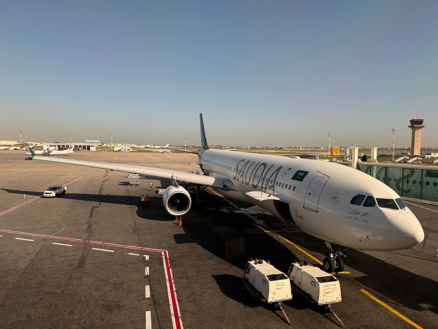 a large white airplane on a runway