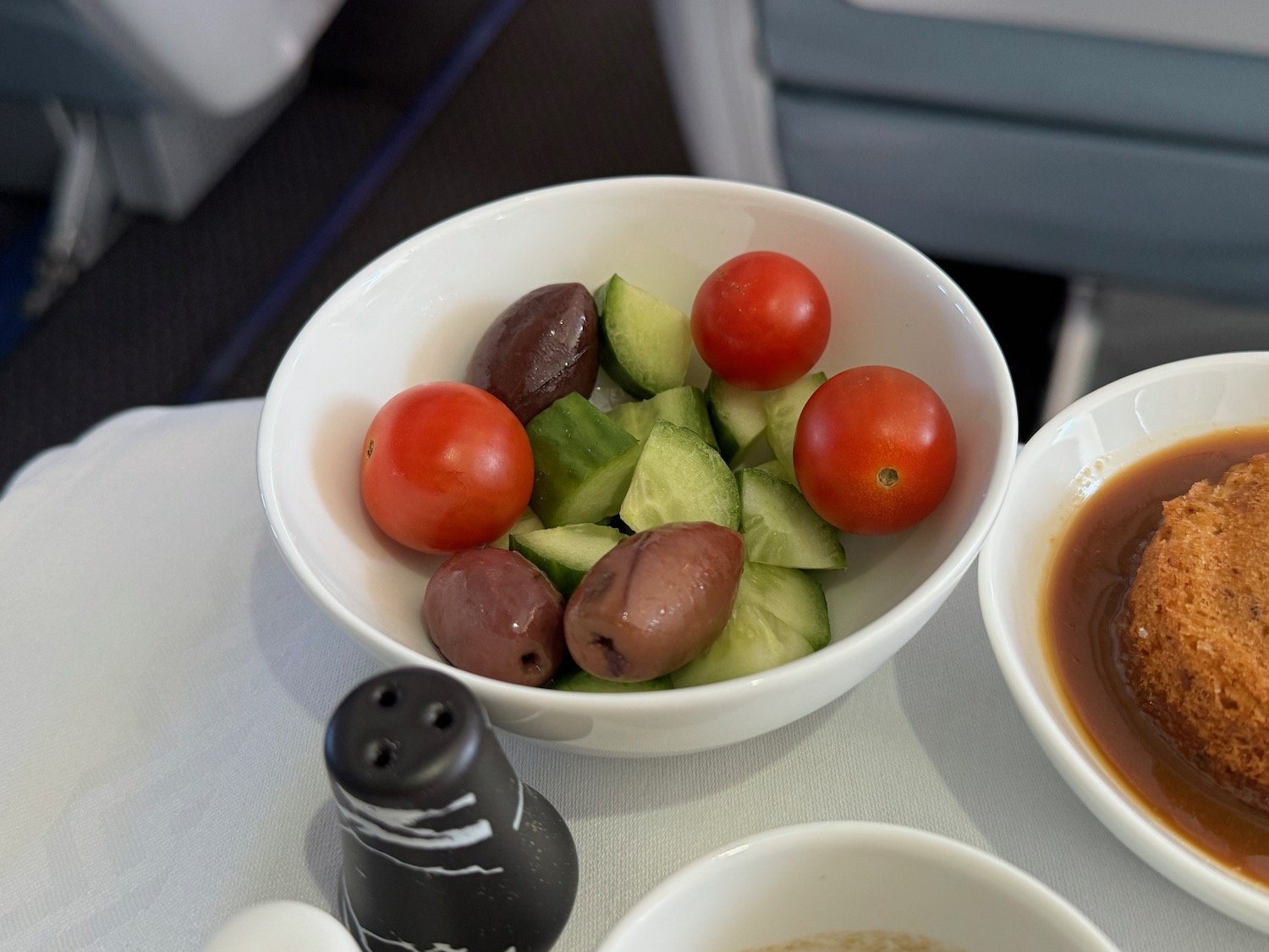 a bowl of vegetables and olives