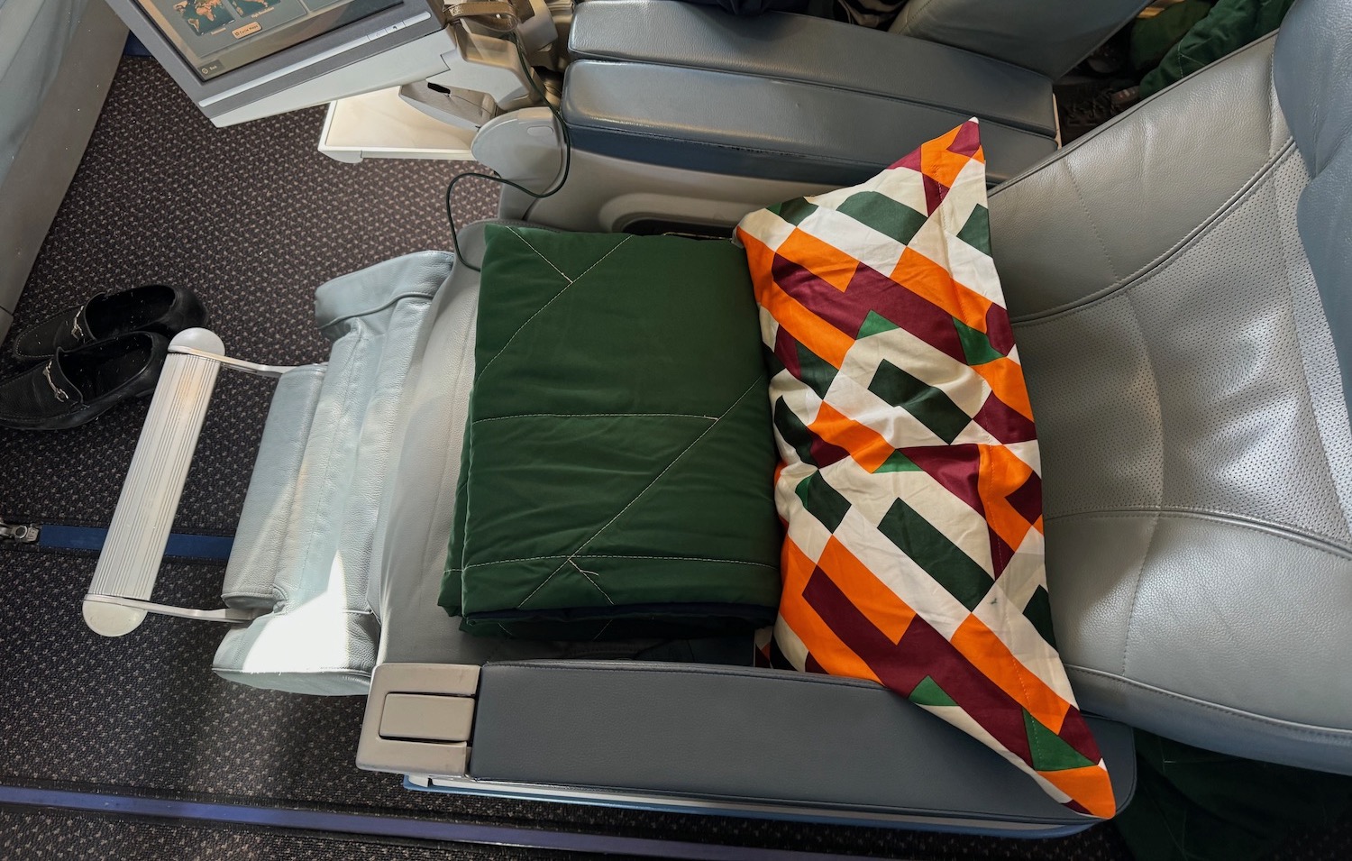 a pillow and a pillow on a seat