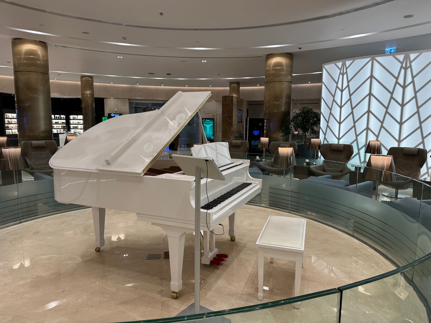 a white piano in a room